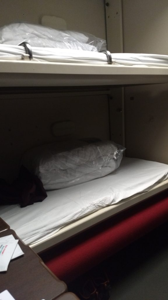 folded down beds in the night train cabin