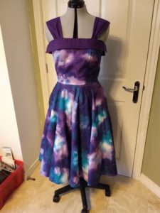 the galaxy dress from the front on a dress form