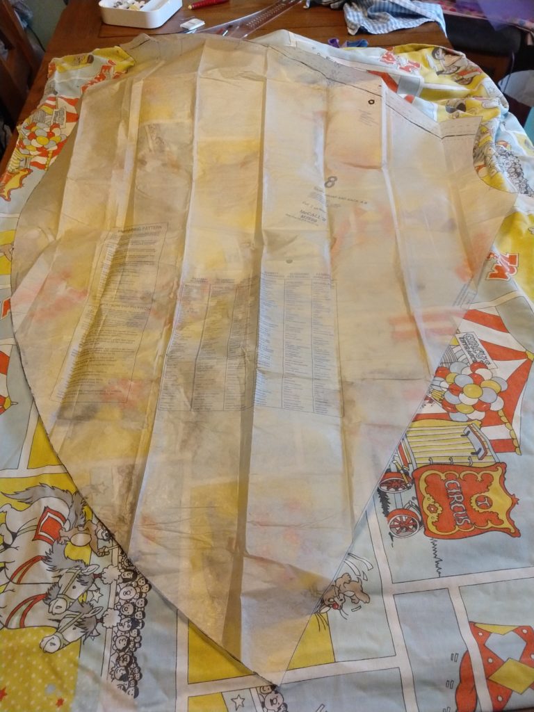 fitting the largest pattern piece on the tom & jerry duvet cover being used for skirt fabric