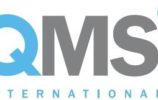 the qms international logo on a white background