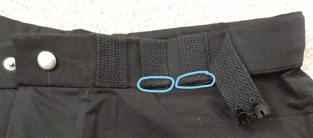 the adjustable waistband of the climbing shorts